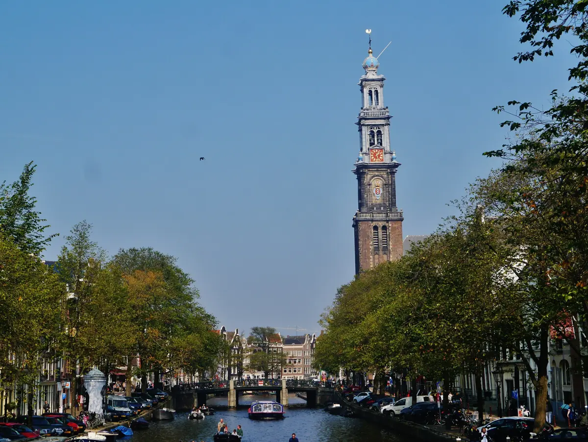 The Westerkerk tower above the canal